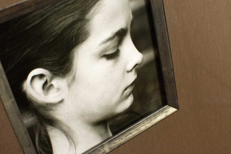 Detail of Portrait photograph by Paula Chamlee in picture frame