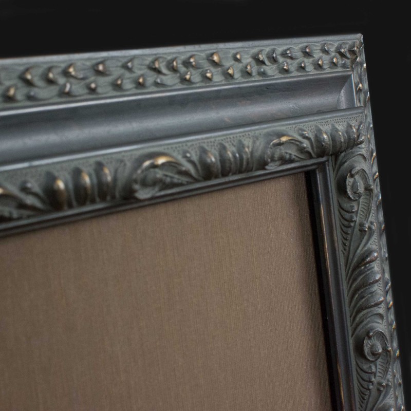 Detail of Portrait photograph by Paula Chamlee in picture frame